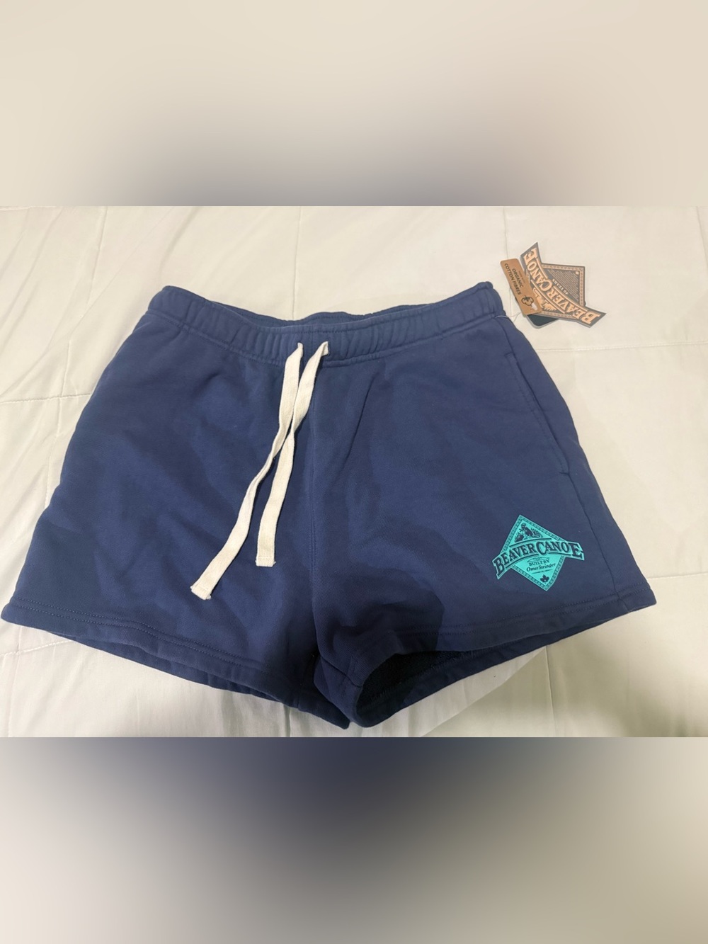 Roots Navy Shorts with White Drawstring and Teal Logo